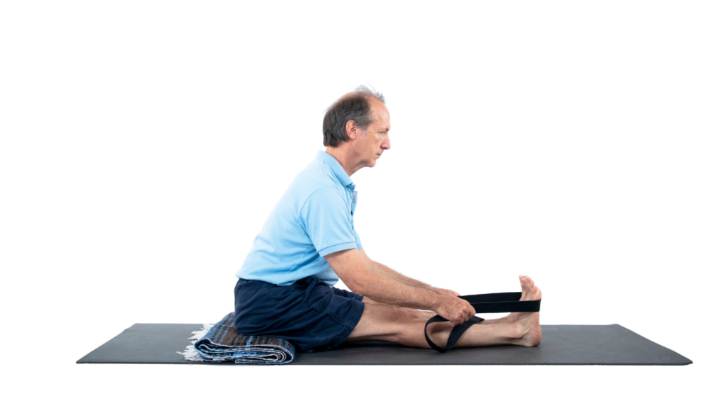 Keep Your Spine Healthy in Forward Bending Yoga Poses – Best Ways to Use a Yoga Strap